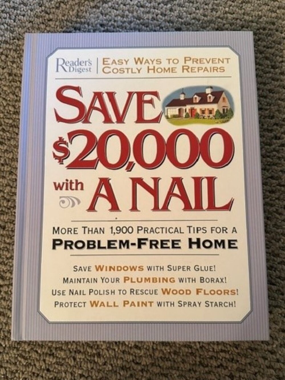 2 home repair books (1 hardcover, 1 paperback)